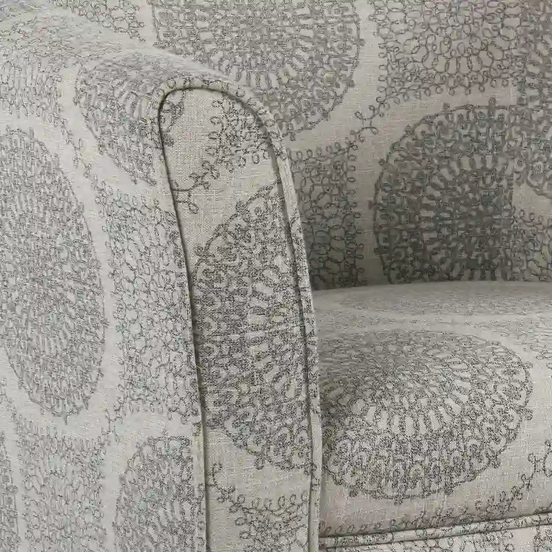 Fauteuil d'appoint gris en forme de baignoire avec médaillon